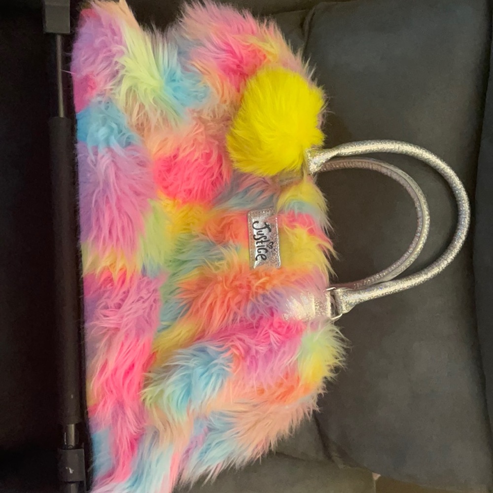 Justice - carry on furry luggage